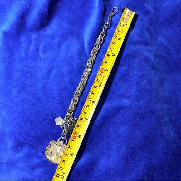 Hello Kitty Silver Charm Bracelet Watch with Pink Bow Accents - Picture 4 of 4